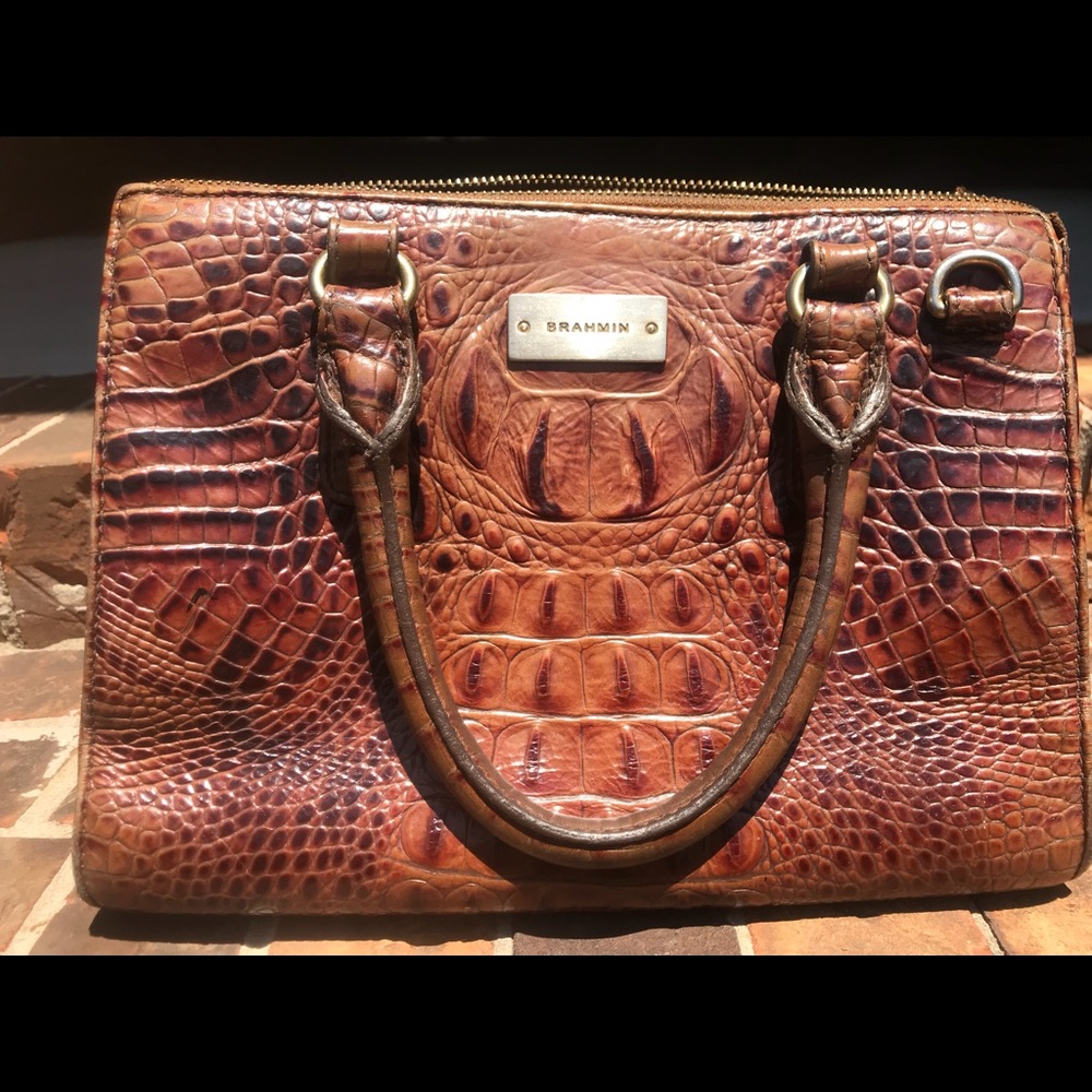 Handbag- Inside has a couple of spots.